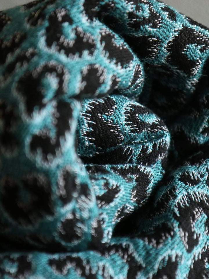 Yaro Ringslynge, Pussycat Trinity Black Petrol Wool