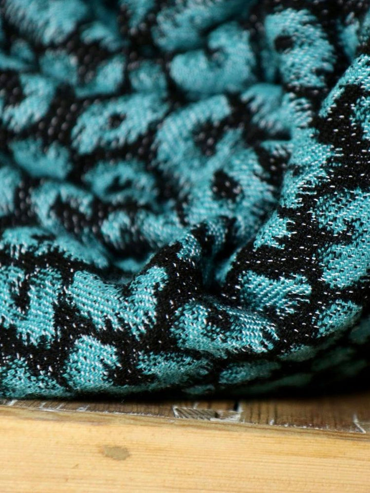 Yaro Ringslynge, Pussycat Trinity Black Petrol Wool